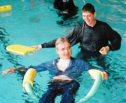 lifesaving class pool practice assisted rescue